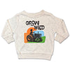 Children's sweatshirt with 'Grow Wild' text and tractor graphic on a white background