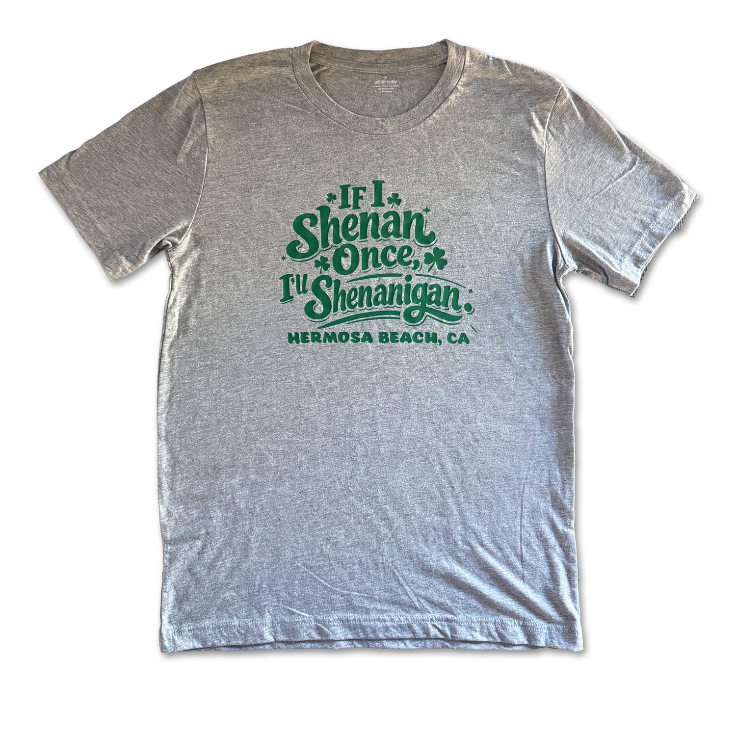 Gray t-shirt with green text 'If I Shenan once, I'll Shenanigan Hermosa Beach, CA' on a white background